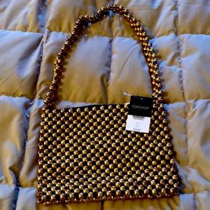 Small gold/black handbag